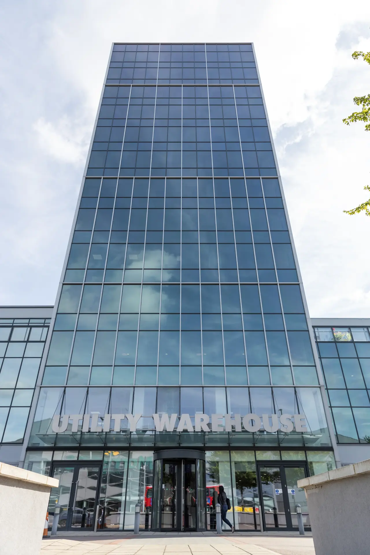 The glass-fronted Utility Warehouse office building, with the Utility Warehouse name above the entrance